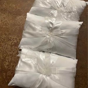 White silk pillows used for kneeling at wedding in good condition